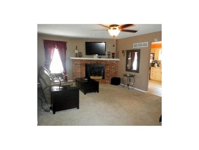 Great room with attractive fireplace.