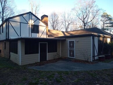 Rear view of house featuring a patio