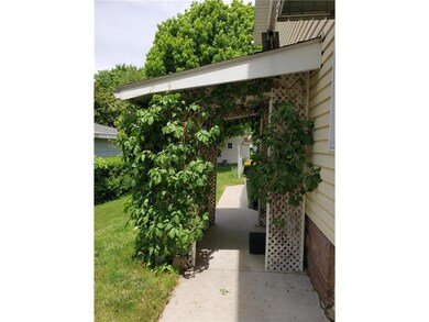 West entrance of house with sitting area