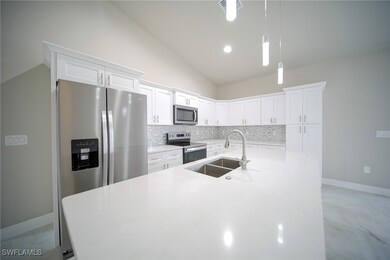 The Island Kitchen Comes With Quartz Countertops, Real Wood Flat Panel Cabinets & Drawers, A Floor To Ceiling Pantry, Brand New Stainless Steel Appliances, And A Tile Backsplash!