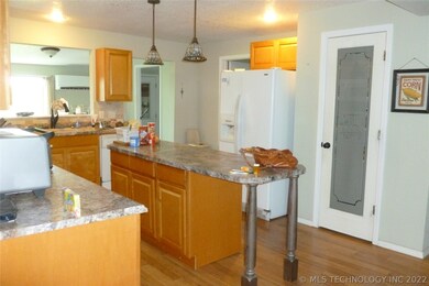 LARGE OPEN KITCHEN WITH DINING AREA