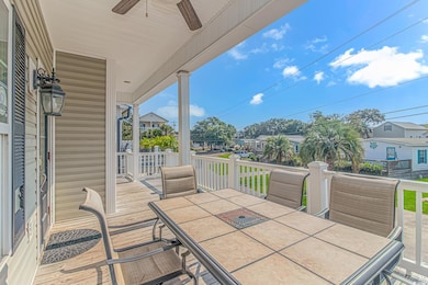 Wooden terrace with ceiling fan