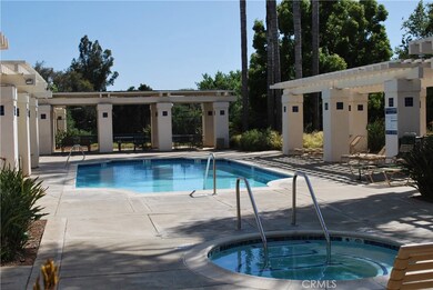POOL AREA WITH PLENTY OF AVAILABLE SEATING TO RELAX