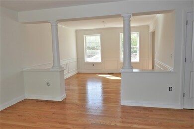 Beautiful columns, Oak hardwood flooring and shado
