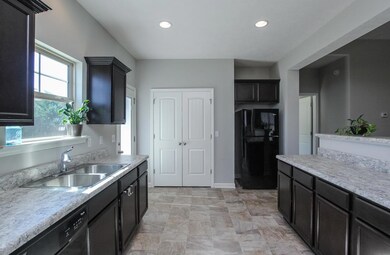 Another angle of the kitchen.  Fridge Stays!