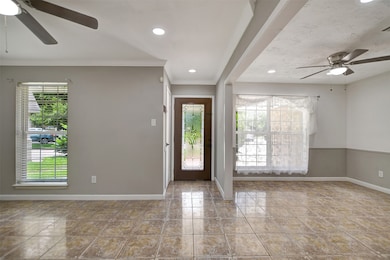 Welcome home to an inviting front entrance, featur