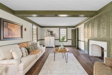 Living room with dark wood-type flooring, a health