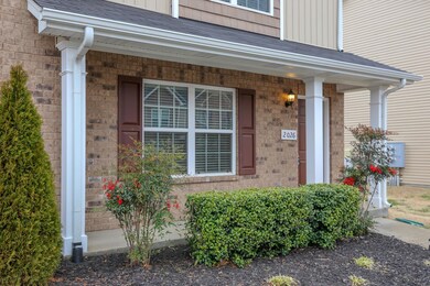 Enjoy the upcoming Spring weather on the covered front porch. Great place to greet your guests.