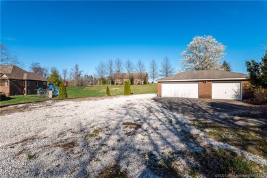 34x22 three car garage!  In 2019, the windows were