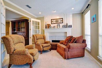 formal living room with gas logs fireplace