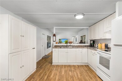 5697 Meadowlark Ln, Bokeelia, FL 33922 - photo 6