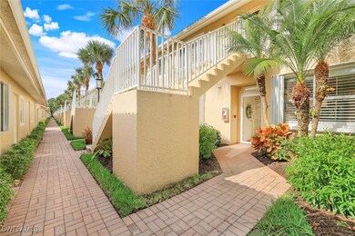 Entrance to property featuring stucco siding