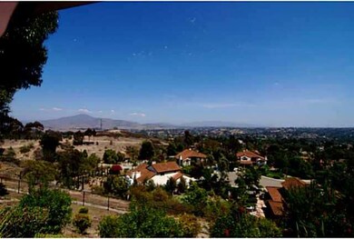Panoramic views of mountains and valley below.  Th