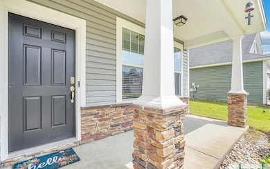 Property entrance featuring a porch