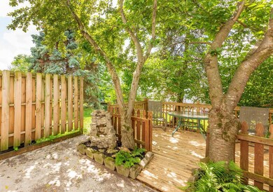 Patio with Deck under Cherry Tree