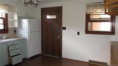 Large eat in kitchen with door to carport & heated laundry room