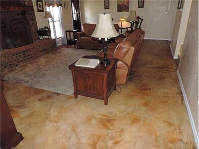 Living Room. Beautiful stained concrete floors.