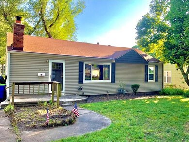Notice the newer storm door and front door on this