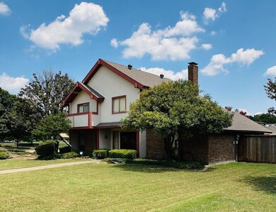 View of front facade with a front yard