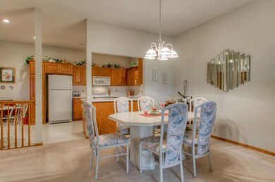 View from dining area into the ktichen, open floor
