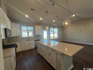 Kitchen featuring stainless steel appliances, a ki
