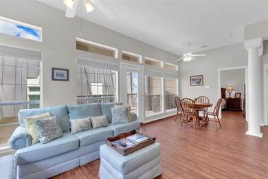 Living area featuring a ceiling fan, healthy amou