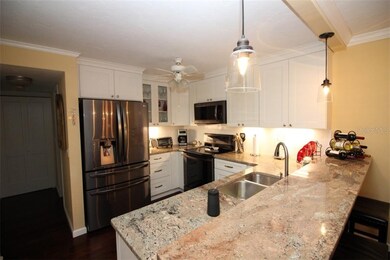 Beautiful kitchen with Granite counters, wood, sof