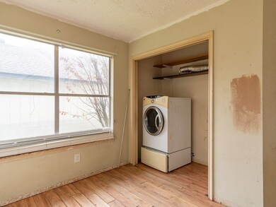 The laundry space is at the breakfast room area. The dryer works per the seller and can stay.