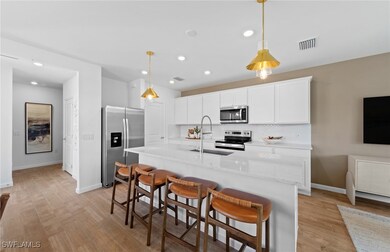 Interior photos are of a staged model home. Illust