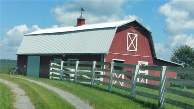 Barn has 2-3 stalls, heated waterers, padded floor