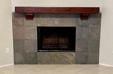 Slate FP has beautiful wood mantel.
