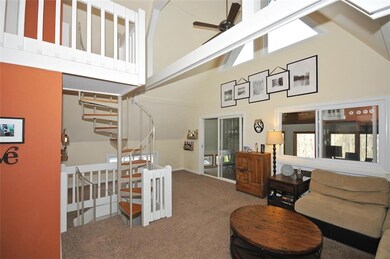 Cozy Living Room with Vaulted Ceiling