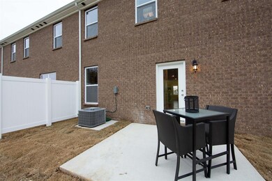 Relax with friends on your private patio with 6' t