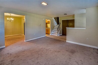 Another view of the living room open to the dining
