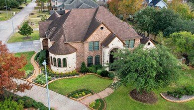 Professional landscaping w/mature trees. Mature Live Oaks, Magnolia, Maple, Japanese Blueberry and Palm trees throughout yard