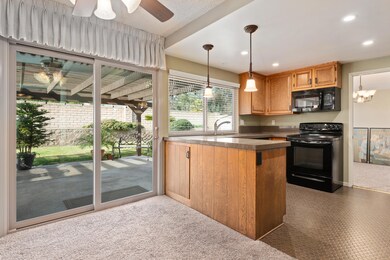 Kitchen with breakfast area views