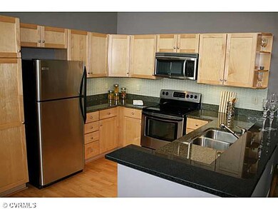 Kitchen - Maple cabinetry, stainless steel applian