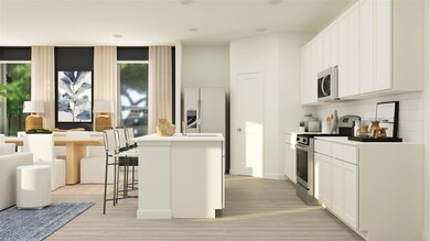 Kitchen with tasteful backsplash, a center island 