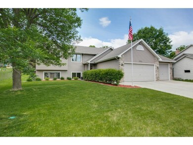 Fantastic curb appeal - lush green lawn, mix of ma