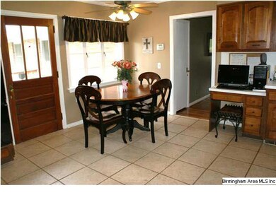 The eatin kitchen opens onto the back deck.