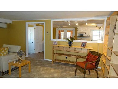 Kitchen. Entertainer s delight.  Living room to hu