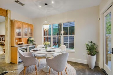 Dining space featuring baseboards, visible vents,