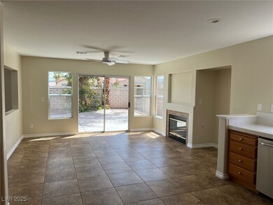 Unfurnished living room with baseboards, visible v
