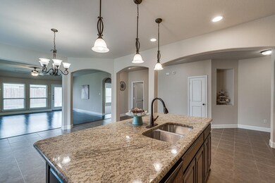 Kitchen with open floor plan, beautiful granite co