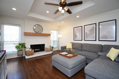 The Brick fireplace takes center stage in the Fami