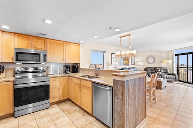 Kitchen with sink, kitchen peninsula, stainless st