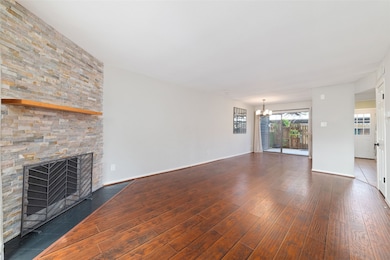 A bright living room featuring modern floors and a