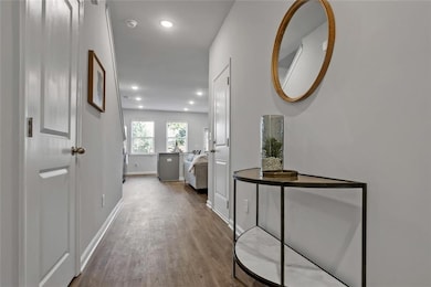 Hallway featuring hardwood / wood-style flooring