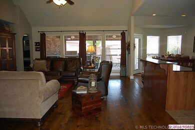 Open Living, hand scraped wood floors with vaulted