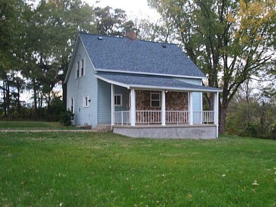 Exterior Back. Large covered back porch to sit and